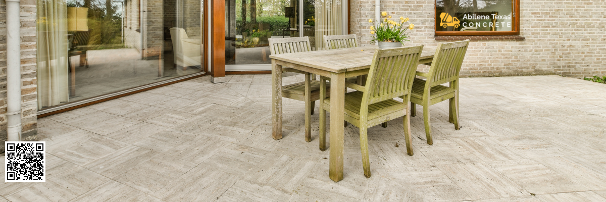 A concrete patio in Clearwater, Florida with patio set.